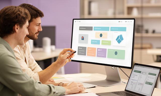 Custom Mac business software dashboard displayed during a workflow planning session